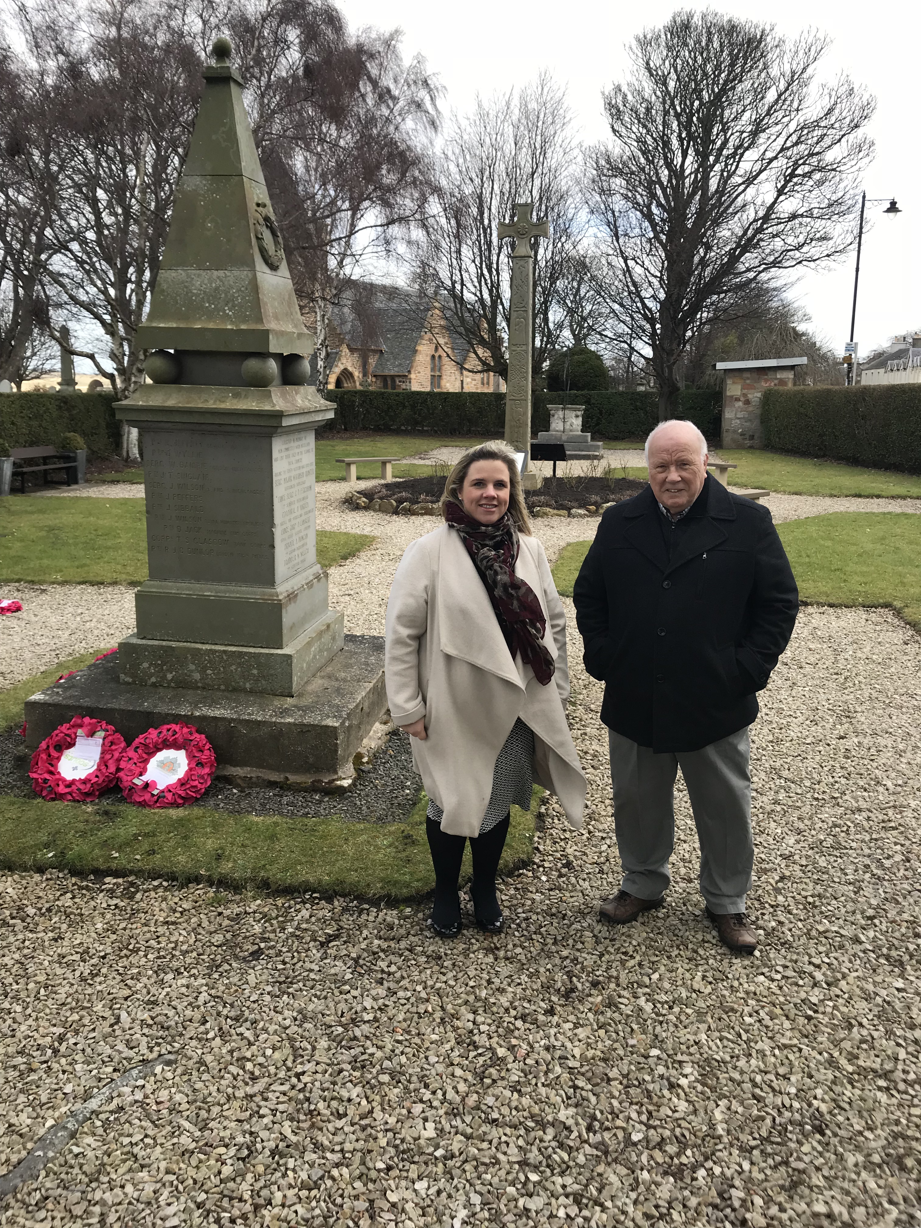 Cruden Homes’ sales and marketing director, Hazel Davies and the  chairman of the Aberlady Community Association, Donald Hay at the Aberlady war memorial 